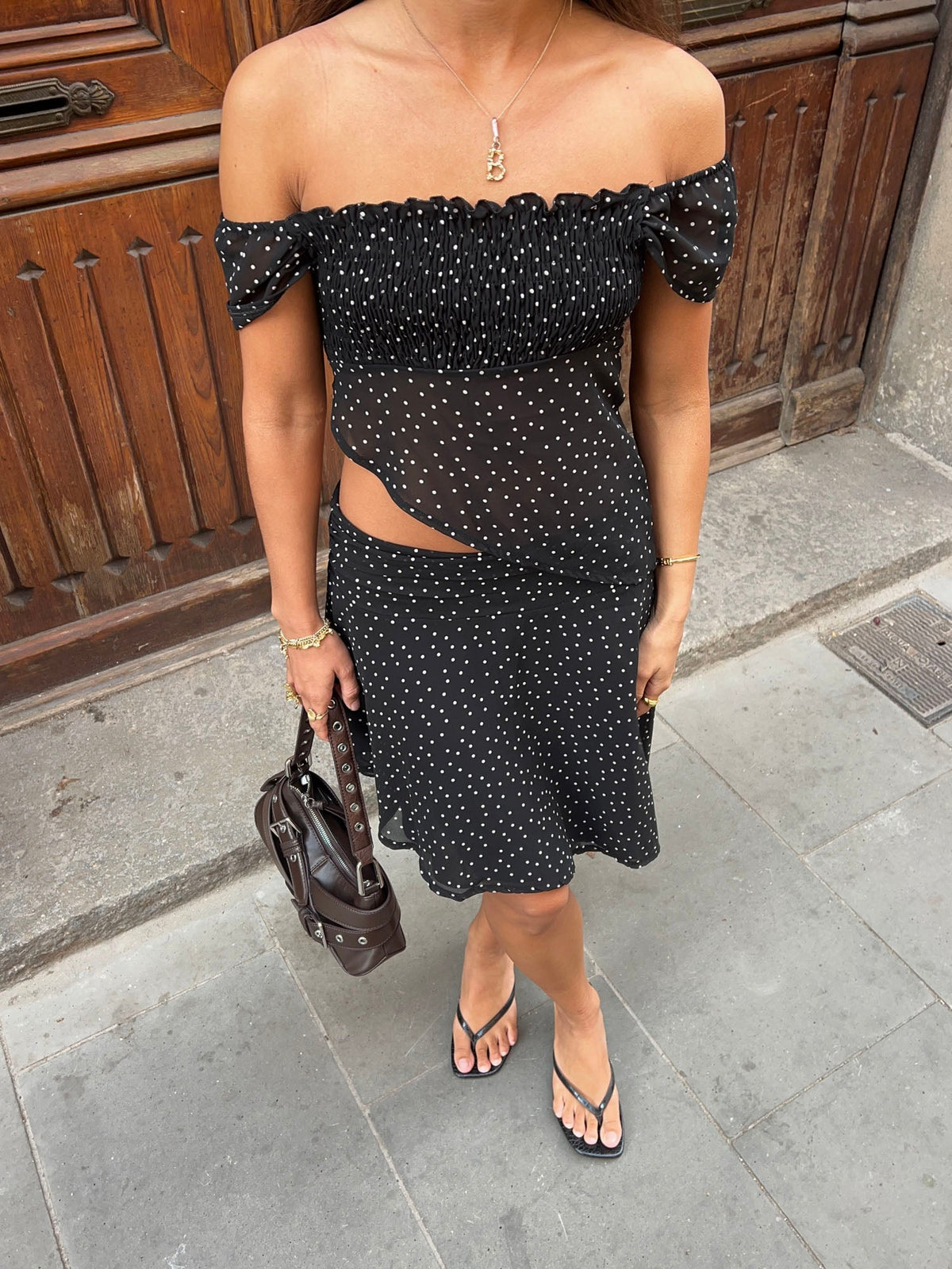 Lyanne asymmetrical top with polka dots – Black/white